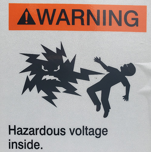 A sign warning about hazardous voltage.